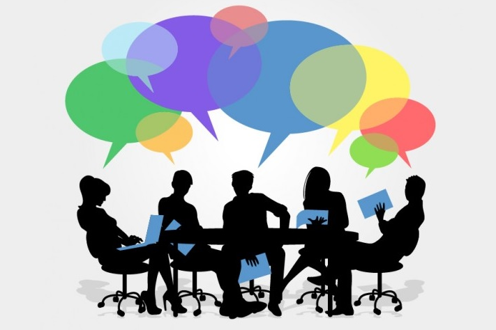 Debate and discussion around a table