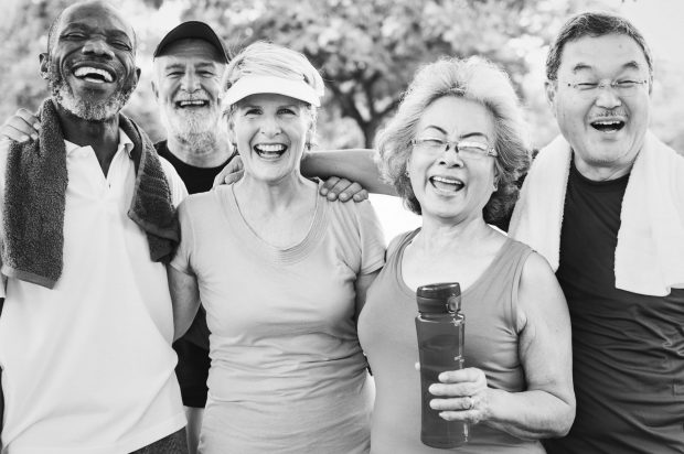 Happy jogging seniors