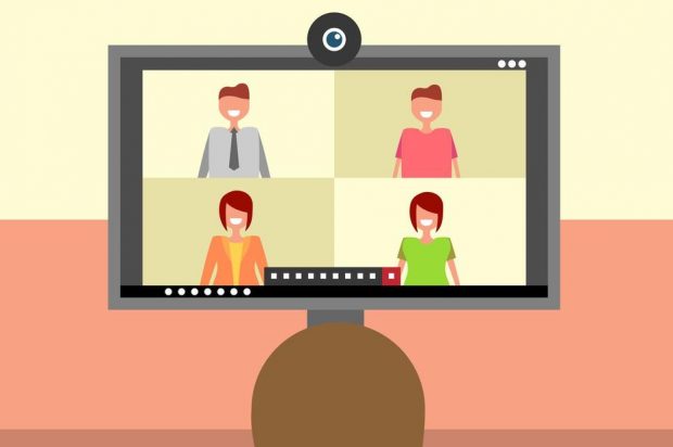 Video conference call. A screen with four participants observed by another.