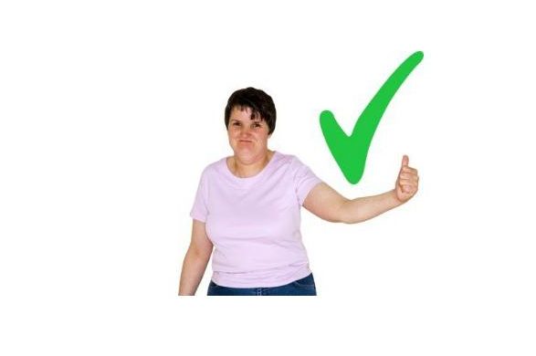 Adult with learning disability with a thumbs up sign