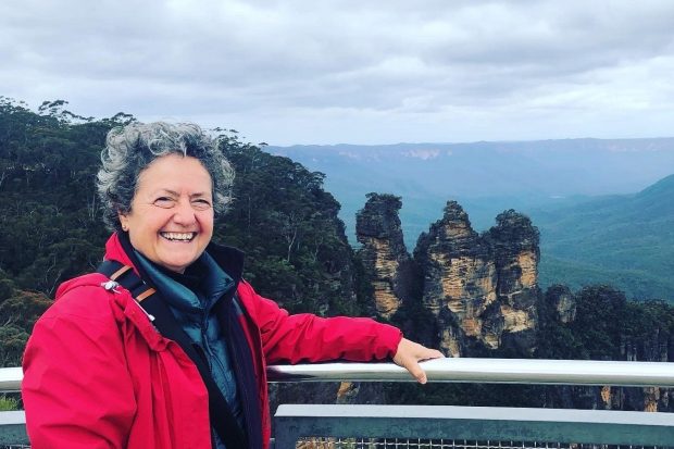 Lyn Romeo enjoys a mountain view on a yoga retreat in Australia.