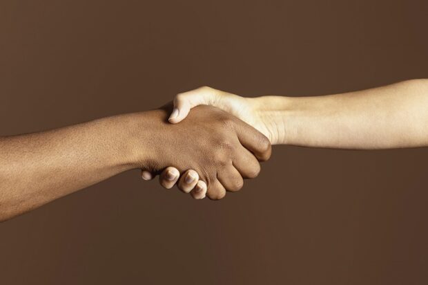 Two people shaking hands