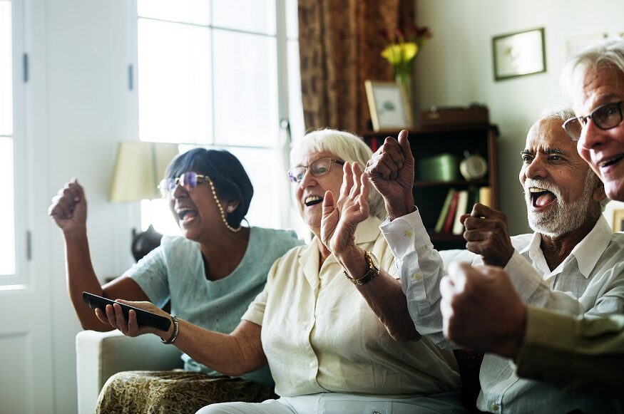 senior-people-watching-televison-together