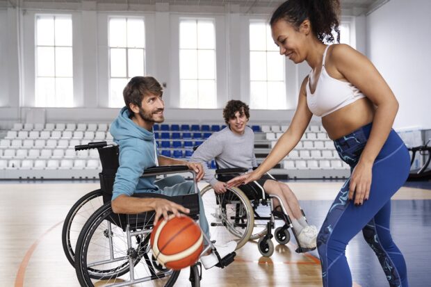 Disabled people playing basketball