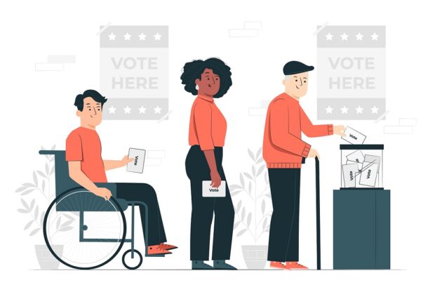 Wheelchair user attending a voting booth